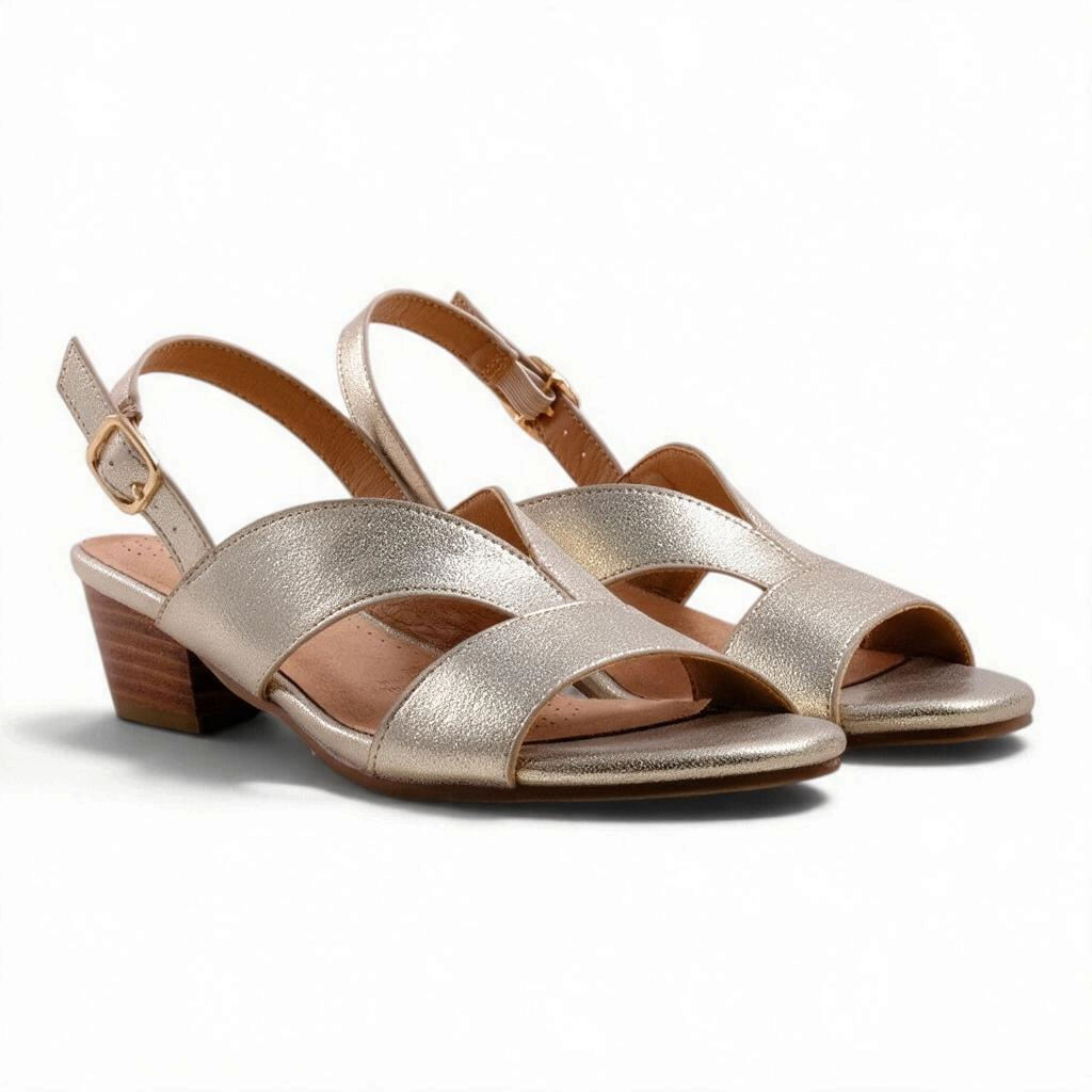 Step Ahead Flone Jasmine champagne metallic leather slingback sandals with a low block heel and comfortable footbed.