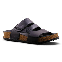 Step Ahead Pesso Blake black leather double-strap sandals with a contoured cork footbed and side stitching detail.
