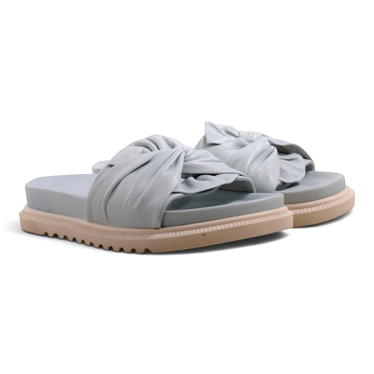 Step Ahead Pesso Borgan Aqua slide sandals in light blue leather with a knotted strap and beige platform sole.