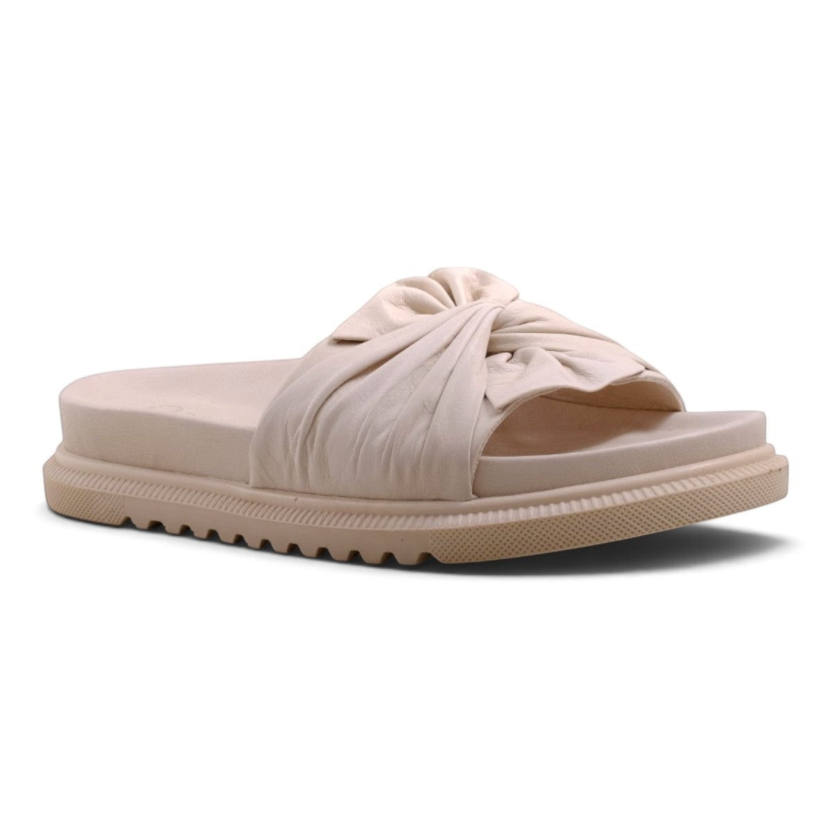 Step Ahead Pesso Borgan cream slide sandals featuring a soft knotted leather strap and a chunky ridged sole
