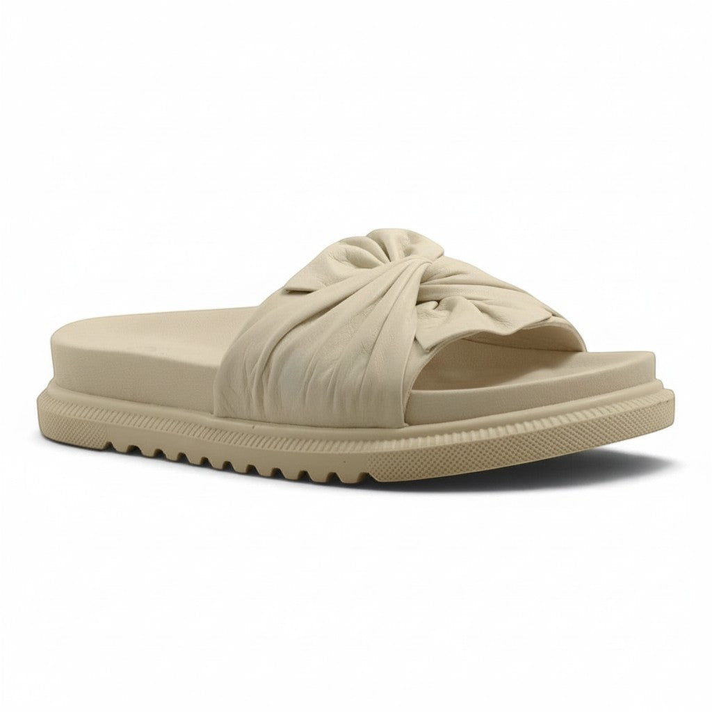 Step Ahead Pesso Borgan cream leather summer slide sandals with a knotted strap and supportive arch footbed.