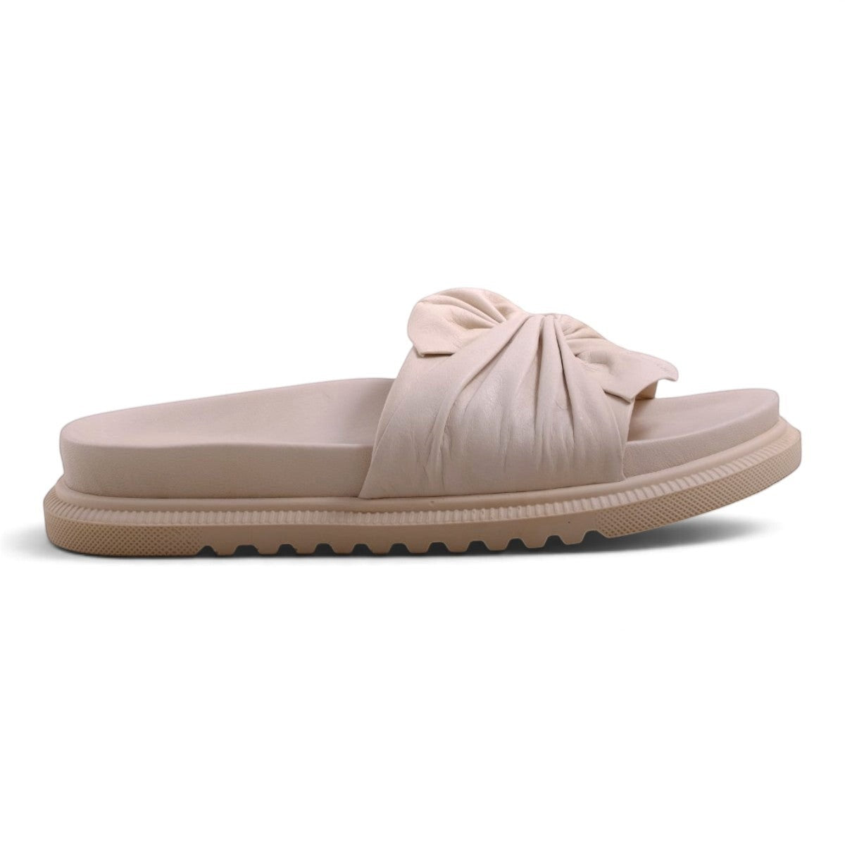 Step Ahead Pesso Borgan cream slide sandals featuring a soft gathered bow detail and a comfortable platform sole.
