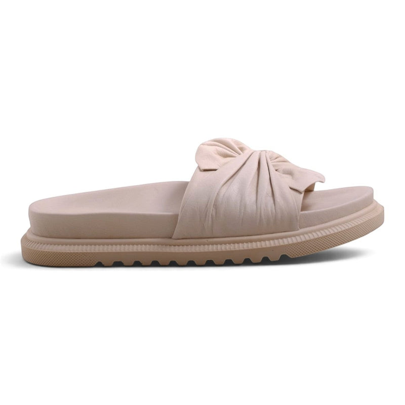 Step Ahead Pesso Borgan cream slide sandals featuring a soft gathered bow detail and a comfortable platform sole.