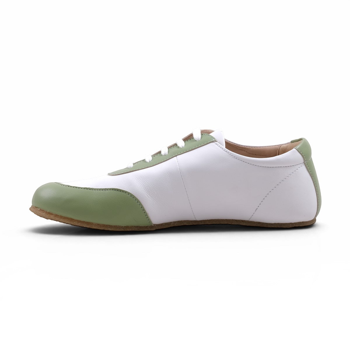 Step Ahead Pesso Mathias barefoot leather sneaker in white and nude with a flexible rubber sole, side view.