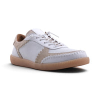 Step Ahead Pesso Penelope white leather and suede sneaker with intricate stitching and a caramel coloured sole