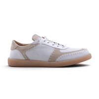 Step Ahead Pesso Penelope white leather and suede sneaker with intricate stitching and a caramel coloured sole.